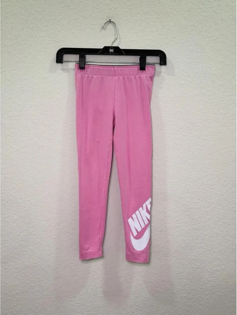 Nike kids pink leggings with white Nike swoosh logo - Size 6